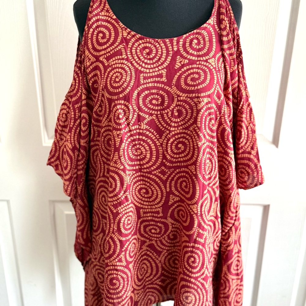 Rust and peach top with cut out arms.